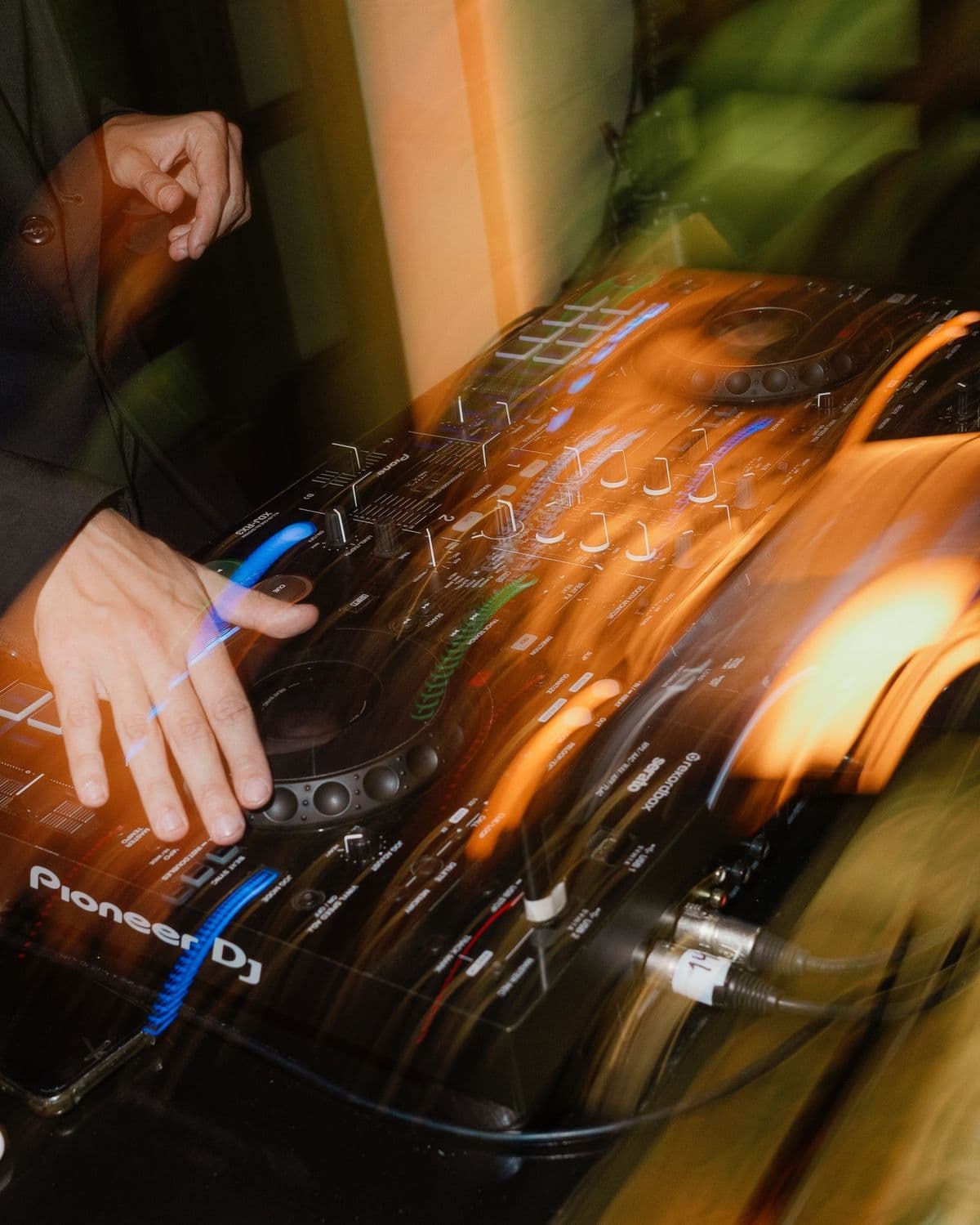 DJ performing at a live event using Gigbook to manage gigs